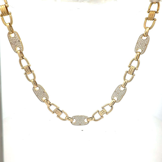 14 Karat Goldkette mit Zikonia von Juwelier Alen, elegantes Schmuckstück mit funkelnden Steinen, sichtbar auf der Kette.