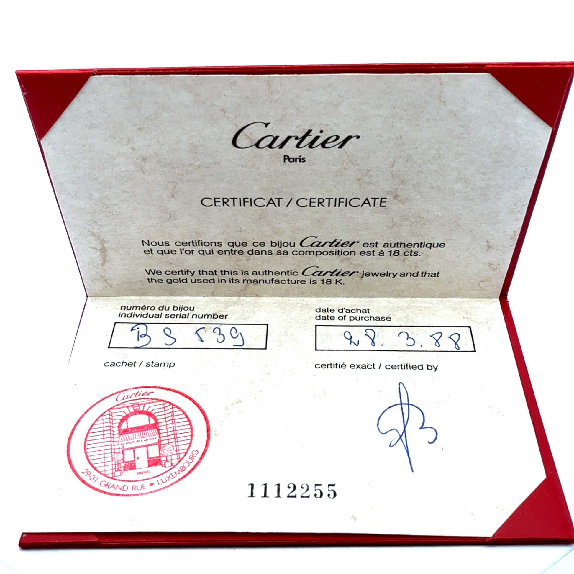 Cartier Trinity Ring aus Gold, mit original Zertifikat, detailreiche Nahaufnahme des eleganten Juwelerring.