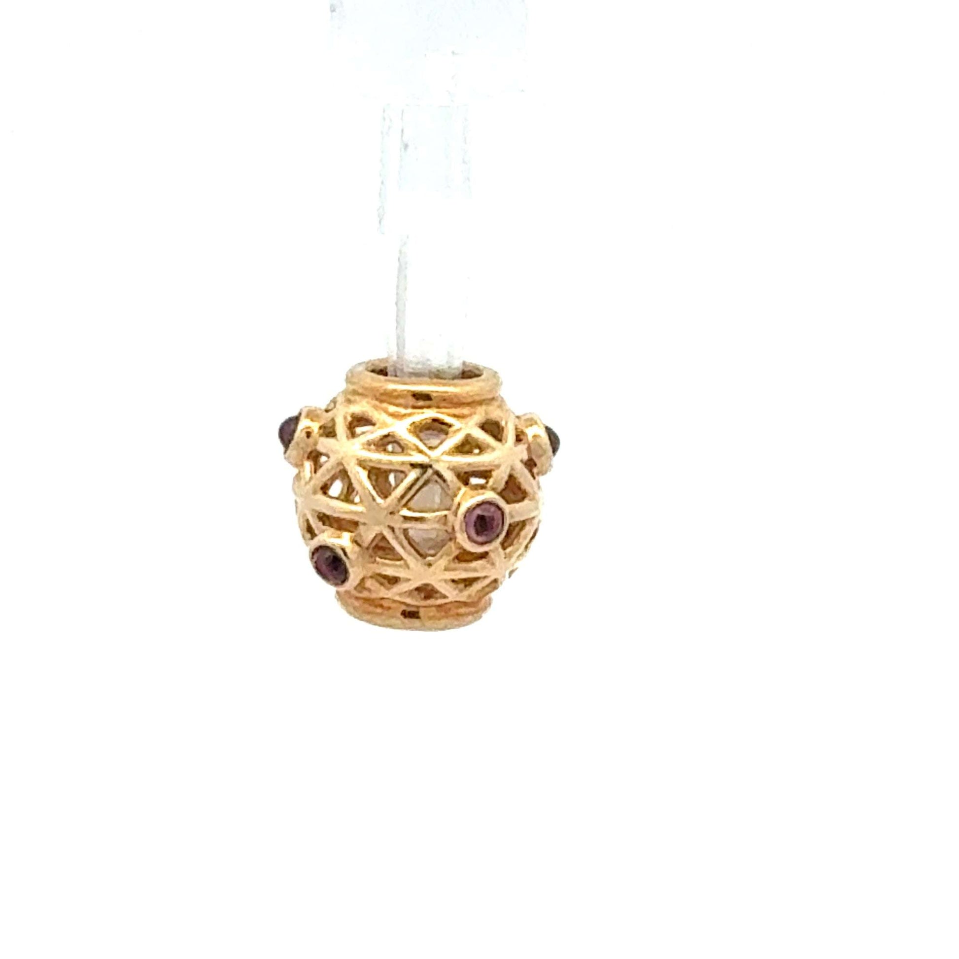Pandora Anhänger aus 585 Gold mit Saphir, 2,41 g, detailreiche Schmuckfigur, glänzendes Edelmetall und blauer Edelstein sichtbar